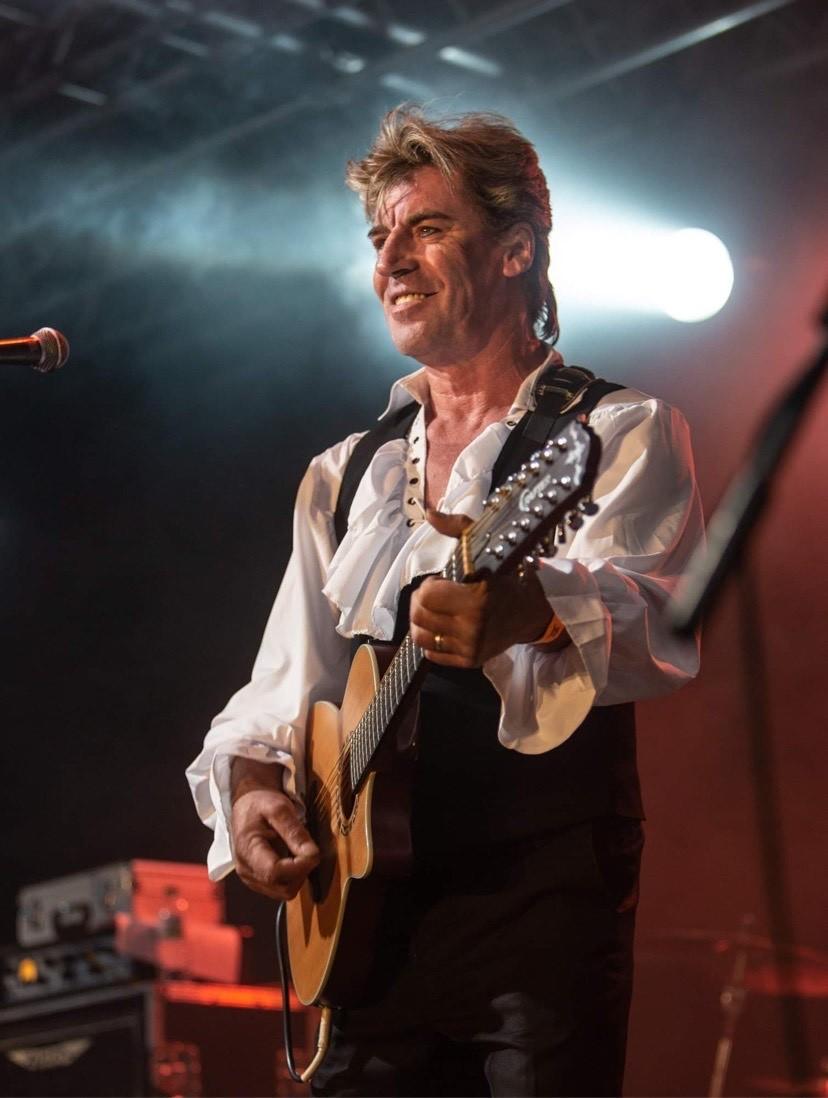 <q>paul with acoustic</q>